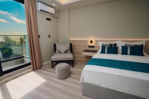 Postel nebo postele na pokoji v ubytování Ocean Pearl Fuvahmulah