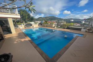 Bazén v ubytování Swiss Villas Panoramic - SHA Certified nebo v jeho okolí