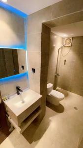 Ένα μπάνιο στο Hotel ALULA
