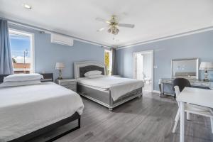 Postel nebo postele na pokoji v ubytování Amy Guesthouse