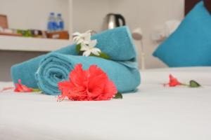 Voodi või voodid majutusasutuse Memo's Inn toas