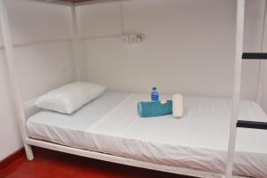 Voodi või voodid majutusasutuse Memo's Inn toas