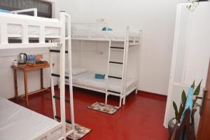 Voodi või voodid majutusasutuse Memo's Inn toas