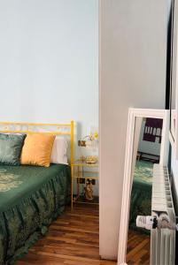 A bed or beds in a room at Affittacamere Firenze in Libertà Parterre