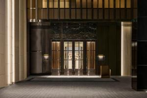 an entrance to a building with glass doors at InterContinental Taichung by IHG in Taichung