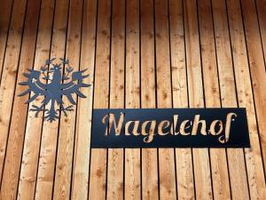 Certifikat, nagrada, znak ali drug dokument, ki je prikazan v nastanitvi Nagelehof Apartment Bendelstein