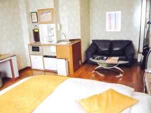 Kuchyň nebo kuchyňský kout v ubytování Hotel Coco de Annex (Love Hotel)