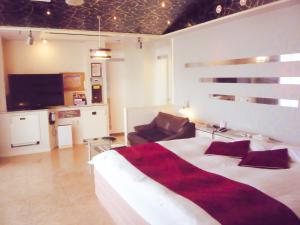 TV a/nebo společenská místnost v ubytování Hotel Coco de Annex (Love Hotel)