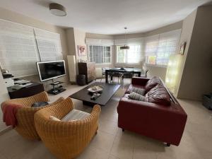 TV a/nebo společenská místnost v ubytování Vivienda Las Velas