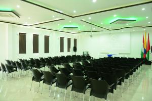 a conference room with black chairs and a white wall at Gran Hotel Internacional Sanbara in Arauca +95 photos