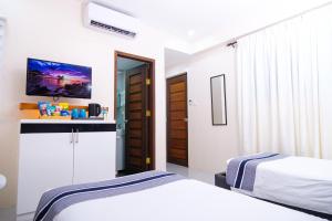 Postel nebo postele na pokoji v ubytování Le Dream Hotel near Vigan