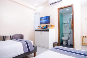 Postel nebo postele na pokoji v ubytování Le Dream Hotel near Vigan