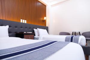 Postel nebo postele na pokoji v ubytování Le Dream Hotel near Vigan