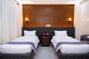 Postel nebo postele na pokoji v ubytování Le Dream Hotel near Vigan