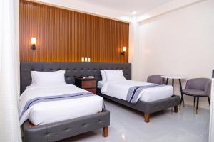Postel nebo postele na pokoji v ubytování Le Dream Hotel near Vigan