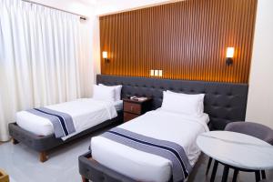 Postel nebo postele na pokoji v ubytování Le Dream Hotel near Vigan