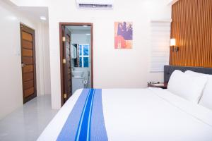 Postel nebo postele na pokoji v ubytování Le Dream Hotel near Vigan