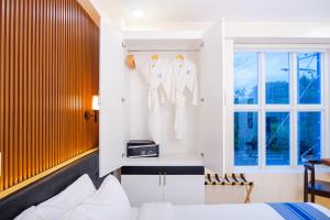 Postel nebo postele na pokoji v ubytování Le Dream Hotel near Vigan