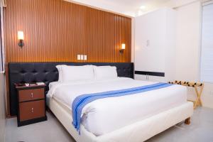 Postel nebo postele na pokoji v ubytování Le Dream Hotel near Vigan