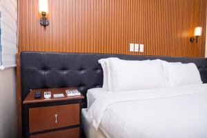 Postel nebo postele na pokoji v ubytování Le Dream Hotel near Vigan