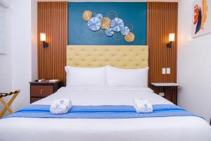 Postel nebo postele na pokoji v ubytování Le Dream Hotel near Vigan