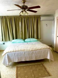 Ένα ή περισσότερα κρεβάτια σε δωμάτιο στο Luna Creciente