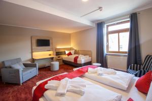 Postel nebo postele na pokoji v ubytování Hotel Lengenfelder Hof
