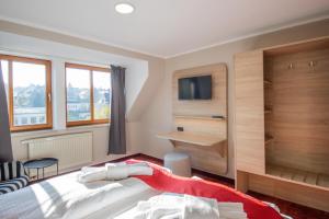 Postel nebo postele na pokoji v ubytování Hotel Lengenfelder Hof