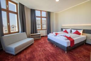 Postel nebo postele na pokoji v ubytování Hotel Lengenfelder Hof