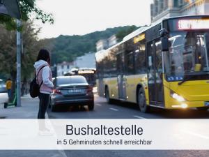 a woman standing next to a car and a yellow bus at Möbliert Wohnen Munich Airport Business Park in Hallbergmoos
