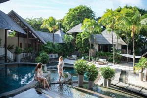 Bazén v ubytování Royal Palm Beachcomber Luxury nebo v jeho okolí