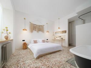Voodi või voodid majutusasutuse YiXi Designe Hotel - Xi'an Bell Tower & Ming City Wall & T'ang Dynasty Ever-Bright City toas