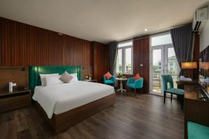 Voodi või voodid majutusasutuse Anise Hotel & Spa Hanoi toas
