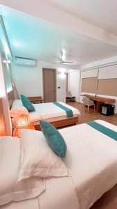Letto o letti in una camera di BAGEECHAA STAY