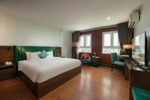 Voodi või voodid majutusasutuse Anise Hotel & Spa Hanoi toas