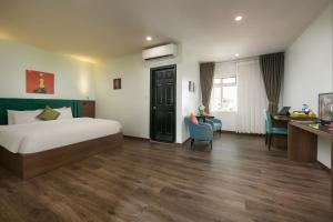 Voodi või voodid majutusasutuse Anise Hotel & Spa Hanoi toas
