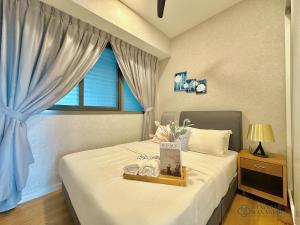 Postel nebo postele na pokoji v ubytování Iskandar Residences Nusajaya by Stayrene + 37 fotografií