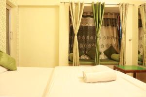 Shiv Shakti Hostel客房内的一张或多张床位