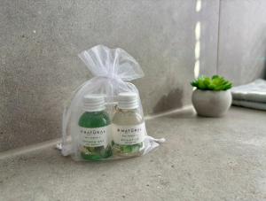 two bottles of vinegar in a plastic bag on a counter at FEWO Klosterblick sowie Weinberge & Drachenflieger in Zeltingen-Rachtig