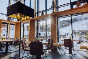 Naturresort PURADIES餐厅或其他用餐的地方