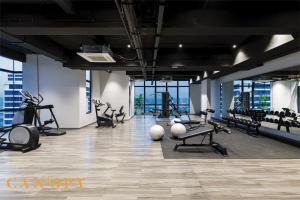 a gym with treadmills and exercise equipment in a building at The Manor Signature Residence, Kuala Lumpur in Kuala Lumpur