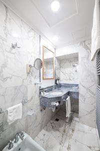 Koupelna v ubytování Phi Hotel Principe