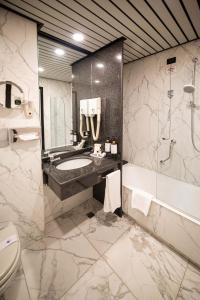 Koupelna v ubytování Phi Hotel Principe