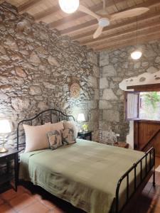 Ένα ή περισσότερα κρεβάτια σε δωμάτιο στο La casa de Eni