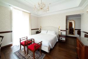 Postel nebo postele na pokoji v ubytování Phi Hotel Principe