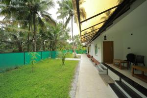 Zahrada ubytování Prakruthi Residency Munroeisland