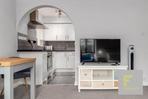 Kuchyň nebo kuchyňský kout v ubytování GuestReady - Cosy Wimbledon Studio Flat