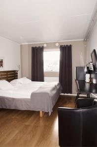 Postel nebo postele na pokoji v ubytování Hotel E-10 by First