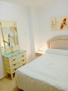Postel nebo postele na pokoji v ubytování APARTAMENTOS SAN ANTON