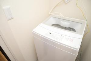 Foto sihtkohas Tōkyō asuva majutusasutuse NYHotel 2 新宿2階建て3室1バスルーム1シャワー2トイレ galeriist